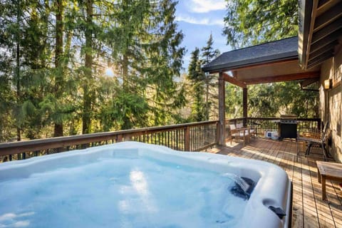 The hot tub is a favorite amenity perfect during warm summers and enchanting winters.