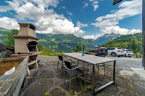 Private terrace with BBQ and panoramic mountain views
