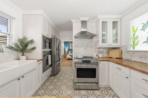 Beautiful coastal kitchen - bright, spacious, and ready for family meals or group dinners
