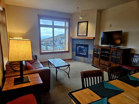 Furniture, Indoors, Living Room, Screen, Lamp