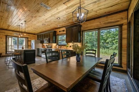 Gather for meals & memories in this open kitchen-dining retreat