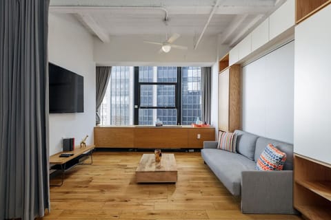 Lounge after a busy day in a calm, minimalist living area.