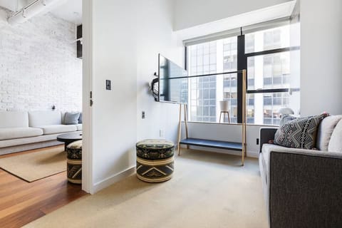 Kick back by the window with streaming-ready TV lounging.