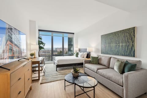 Unwind in a bright studio retreat with expansive city outlooks.