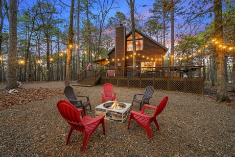 Cozy firepit area perfect for gathering in the evenings, sharing conversations, and enjoying the warm, relaxing outdoor ambiance.