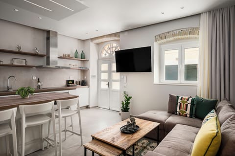 Superior Apartment, 1 Queen Bed with Sofa bed | Living area | 32-inch Smart TV with digital channels