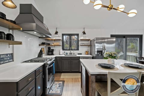 Well-equipped kitchen with quality appliances and ample prep space - everything you need for breakfast to gourmet dinners