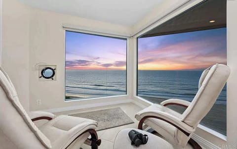 Sunset Luxury! Watch the Pacific Ocean come alive with brilliant evening colors from your plush, oceanside retreat. This dedicated corner is perfect for enjoying a magical West Coast sunset and unwinding after a day of fun.
