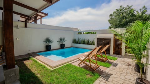 Dip into your own private pool at this sun-soaked cabin retreat in Pedasí, Panama.