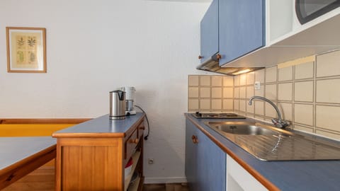 Fully equipped kitchen with all essentials for a comfortable stay.