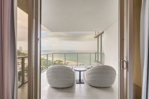 Condo Exterior | 2 Balconies w/ Seating | Pool, Beach & Ocean Views