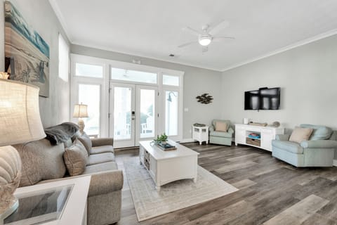 Beautiful living room with natural light. Snuggle up!