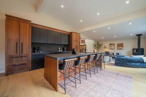 Open kitchen and living space that keeps everyone connected — ideal for family gatherings, holidays, and group trips.