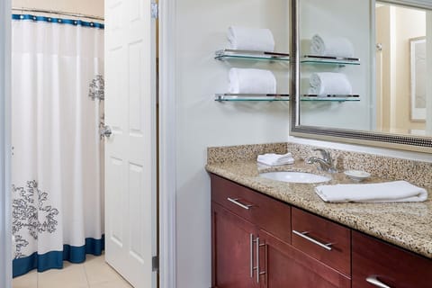 Studio, Multiple Beds, Roll-in Shower | Bathroom | Hair dryer, towels, soap, shampoo