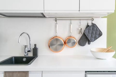 We believe the little things matter! This image highlights the well-stocked and spotless detail area of your kitchenette, perfect for preparing light meals.