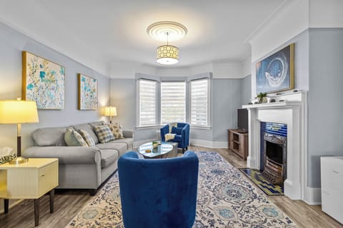Bright and cozy living area with plush seating and plenty of natural light.
