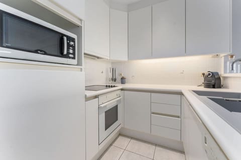 Kitchen with kitchen utensils and utilities