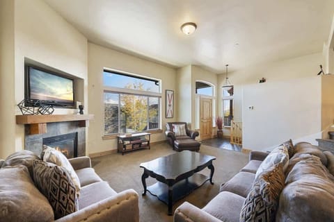 Spacious Living room with easy access to garage and front entry