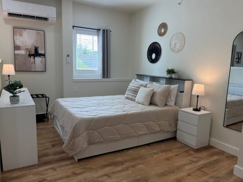 Queen bed in studio sleeping area