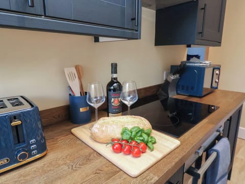 Fridge, microwave, toaster, cookware/dishes/utensils