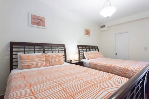 2 Queen beds in the bedroom with Flat screen TV