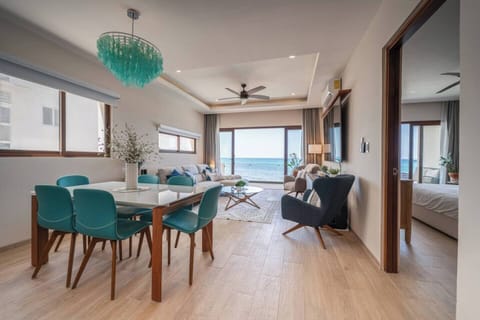 Open the sliding doors to let the ocean breeze fill the room as you relax and unwind, enjoying incredible sea views from your spacious living area.
