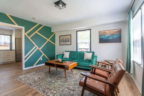 Living Room: Vibrant colors and stylish decor create the perfect retreat for relaxation!