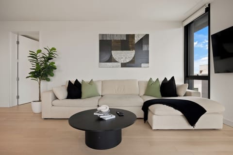 Lounge on the plush sectional for cozy nights or morning coffee.