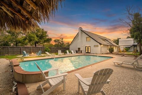 Embrace the elegance of this well-appointed and tranquil pool area