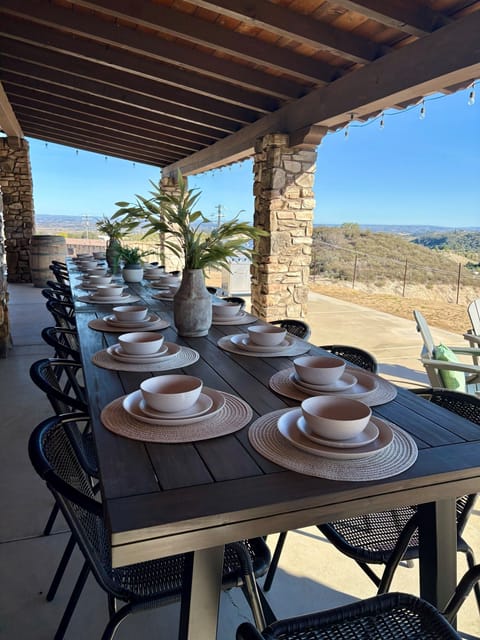 Ample seating for 20 guests, now with adjacent bocce ball court adding to the ambiance