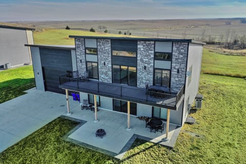Spacious Nebraska lake house with huge garage and nearby homes for big groups.
