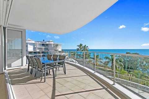 Oceanfront dining on a spacious sun-drenched balcony.