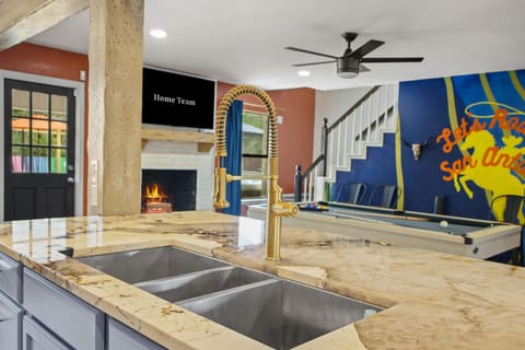 Sure, it’s just a sink — but when it looks this good, even washing dishes feels like self-care. Whether you’re cleaning up after cocktails or prepping for dinner, this stylish spot keeps the kitchen looking cool and collected.