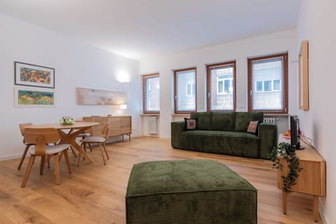 Basic Apartment, Balcony | Living area | 35-cm TV with satellite channels