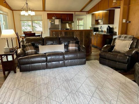 Cozy, comfy living room area with plenty of spect to lounge. 