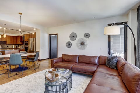 Spacious great room layout connecting the seating area to the gourmet kitchen and dining space.