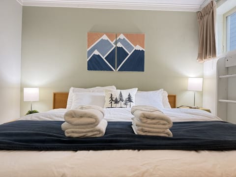 Comfortable king-size bed for a restful stay.
