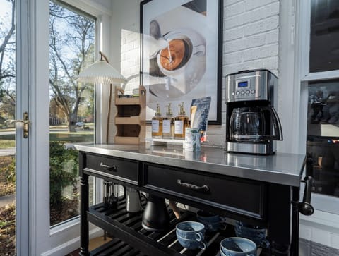 Start your morning in the sunroom with a fresh brew from the dedicated coffee and tea bar, where natural light and peaceful views create the perfect setting to ease into the day.
