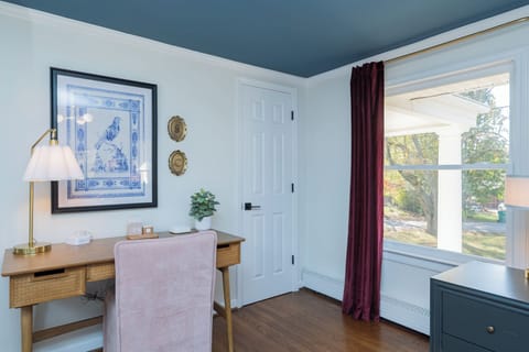 Find a quiet moment in this cozy workspace, where natural light and calming decor create the perfect place to catch up on emails, plan your day, or unwind with a good book.
