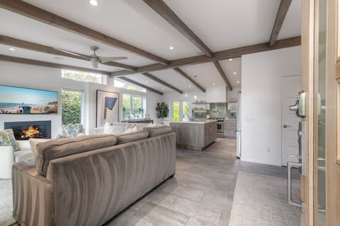 You enter the front door into a bright open living area