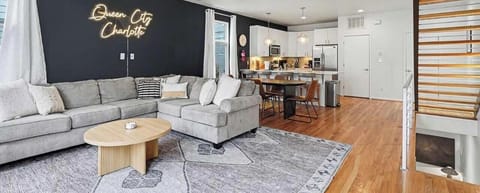 Unwind after a full day exploring the Queen City in this bright, open second-floor living space. The seamless flow between the kitchen and living room makes it easy to relax, dine, and stay connected with your guests.