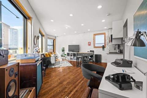 Relax and recharge in this serene loft retreat, featuring sleek interiors and inspiring views.