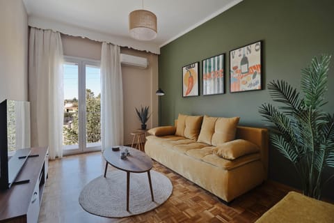 Comfort Apartment, City View | Living area | Flat-screen TV