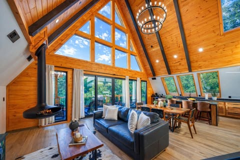 Relax by the modern fireplace with wine or enjoy cozy movie nights.