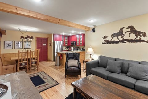 Hardwood floors flow through the bright, inviting open concept space.