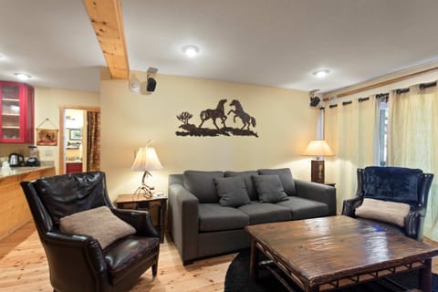 Relax by the gas fireplace with surround sound and sleeper sofa.