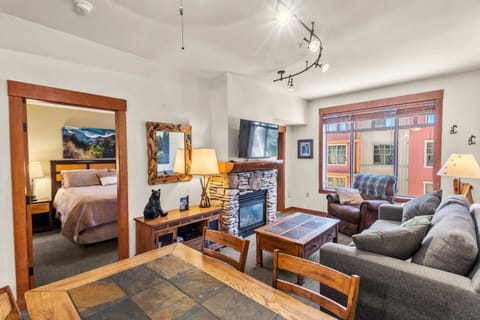 Cozy living area with gas fireplace, Smart TV.