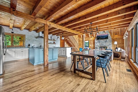 Formal dining table seats 8+ right next to the spacious kitchen.