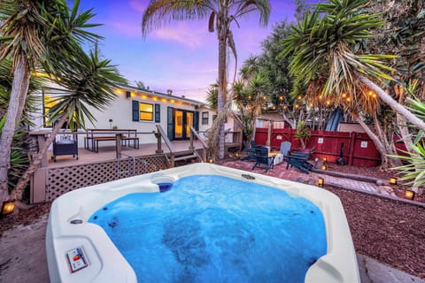Private backyard oasis with hot tub & pool – perfect for relaxing getaways