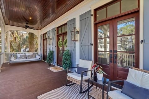 Claim the porch swing before anyone else does — morning coffee, an afternoon book, the kind of slow Lowcountry hour you came here for.